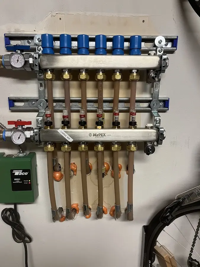 Plumber performing Water Heater Repair at a residential property in Searcy